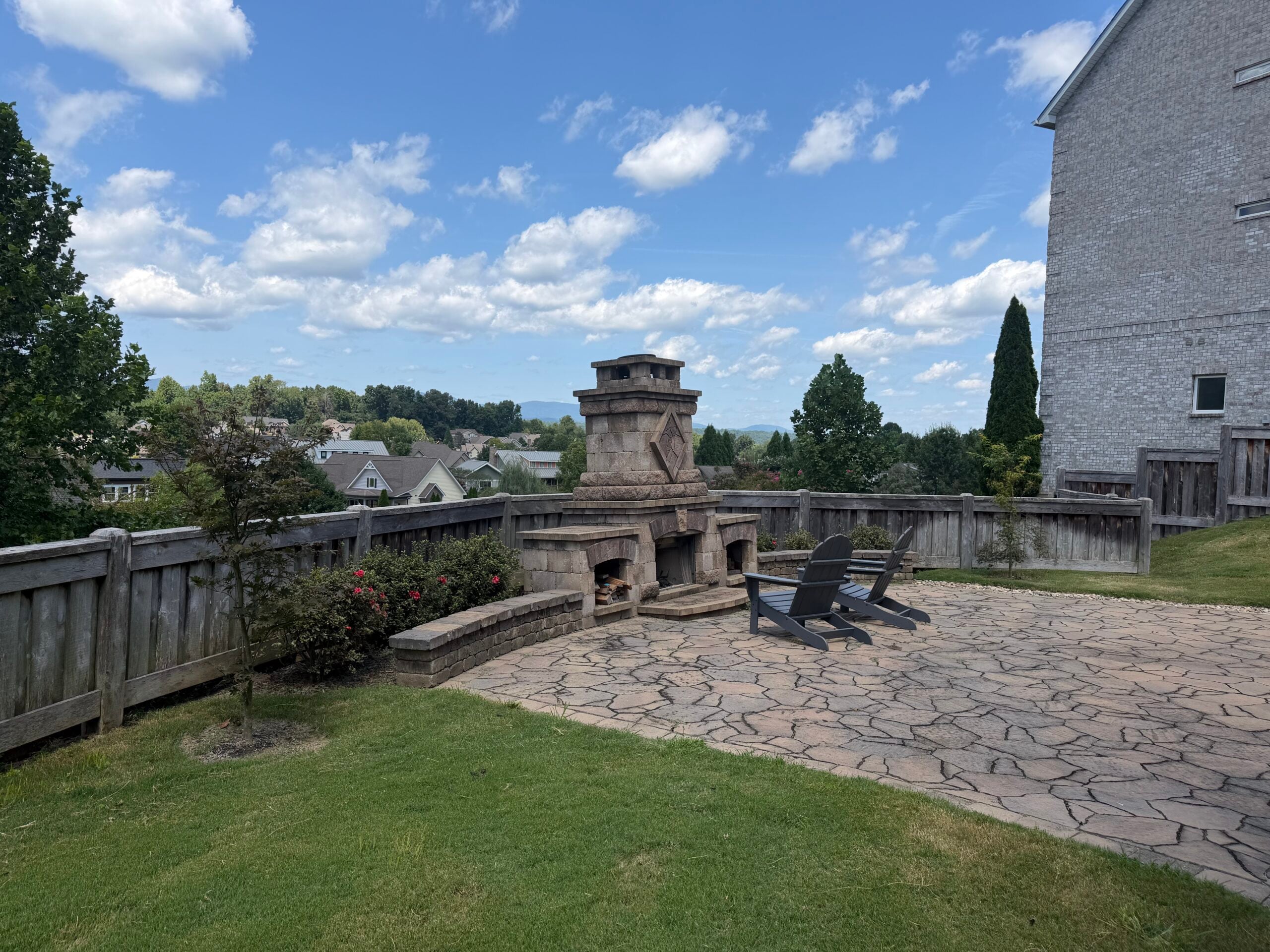 Stone outdoor fireplace and patio built by Q36 in Oak Ridge, Tennessee